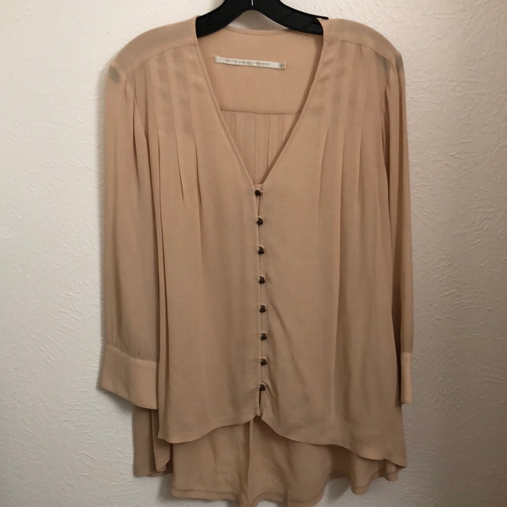 Blush blouse with great detail size medium.